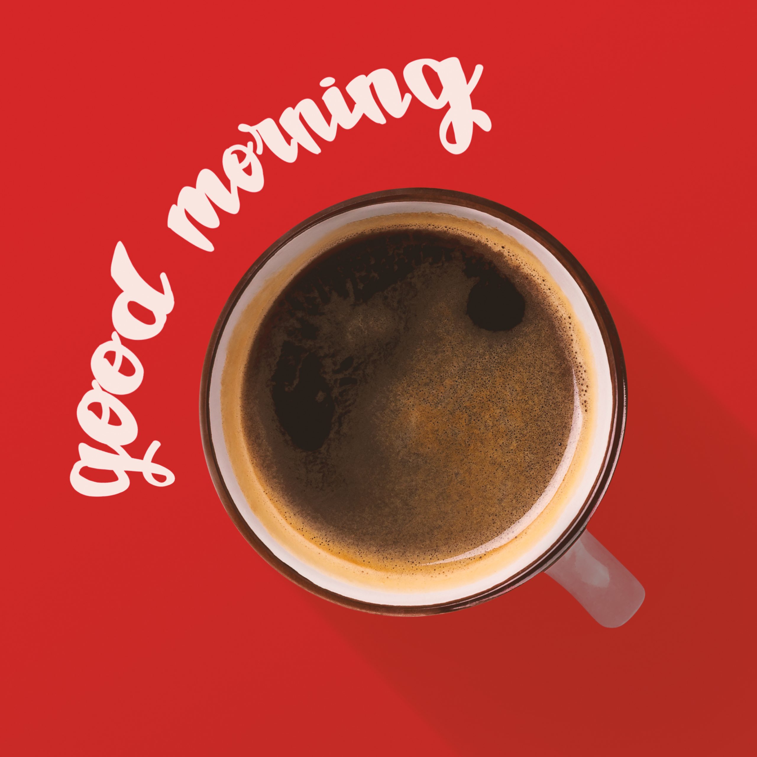 Cup of aroma coffee over red background